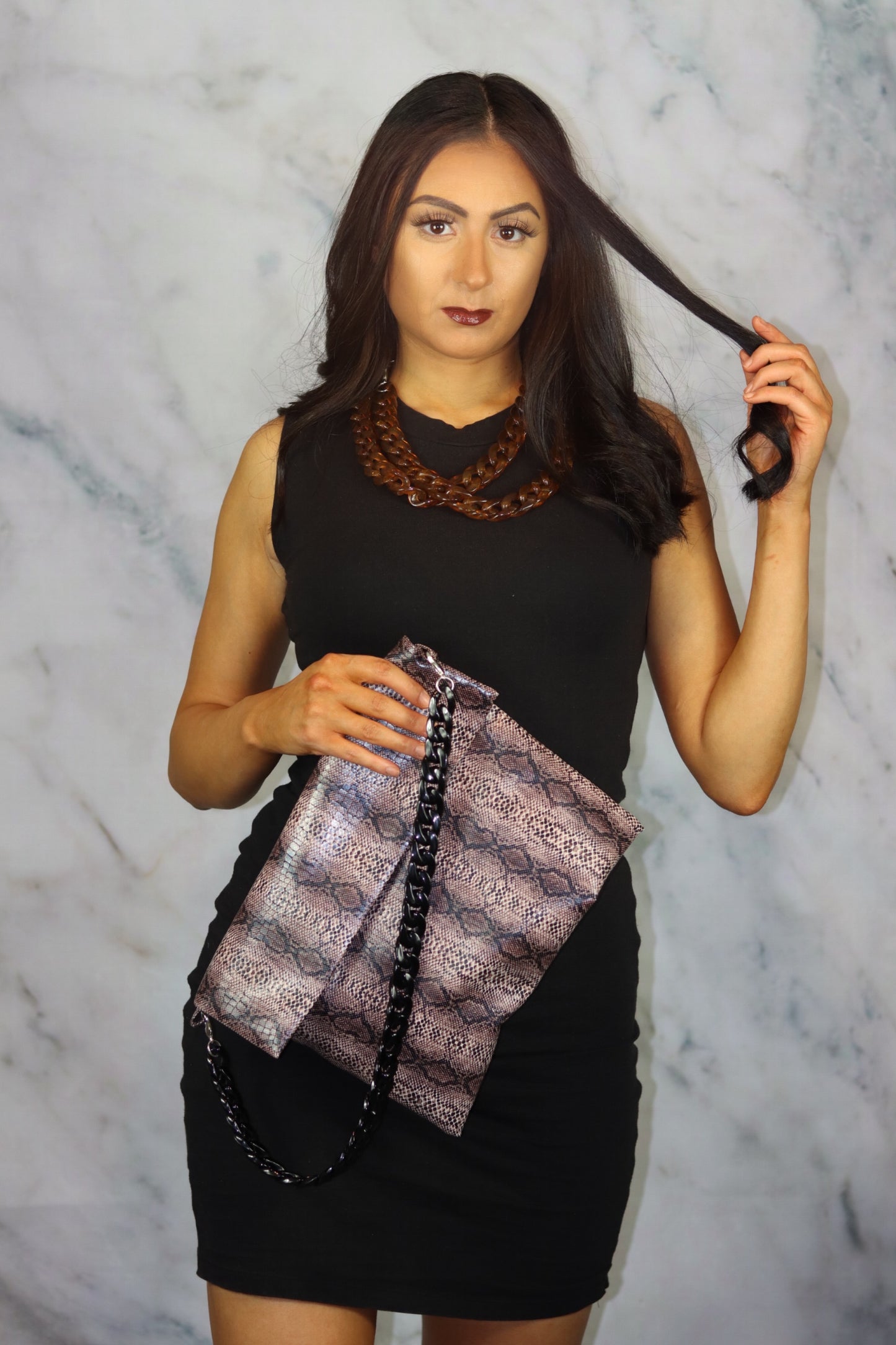 Brown Snake Print Clutch Bag